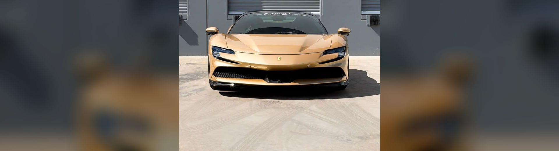 Oro Chiaro Ferrari SF90 Stradale with full-car PPF at Purple Flare Wraps in Henderson