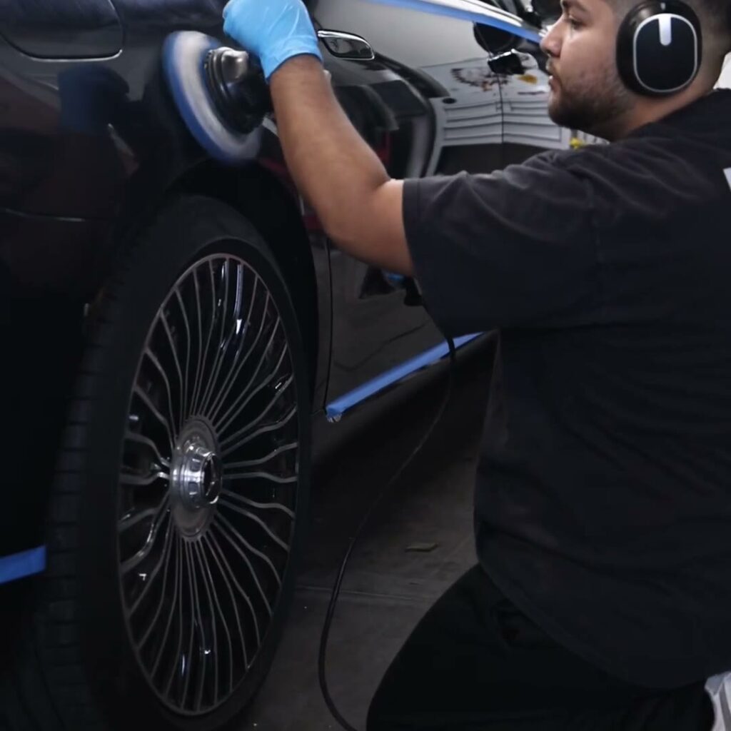 Paint correction Las Vegas: technician machine polishing a Maybach in Henderson NV