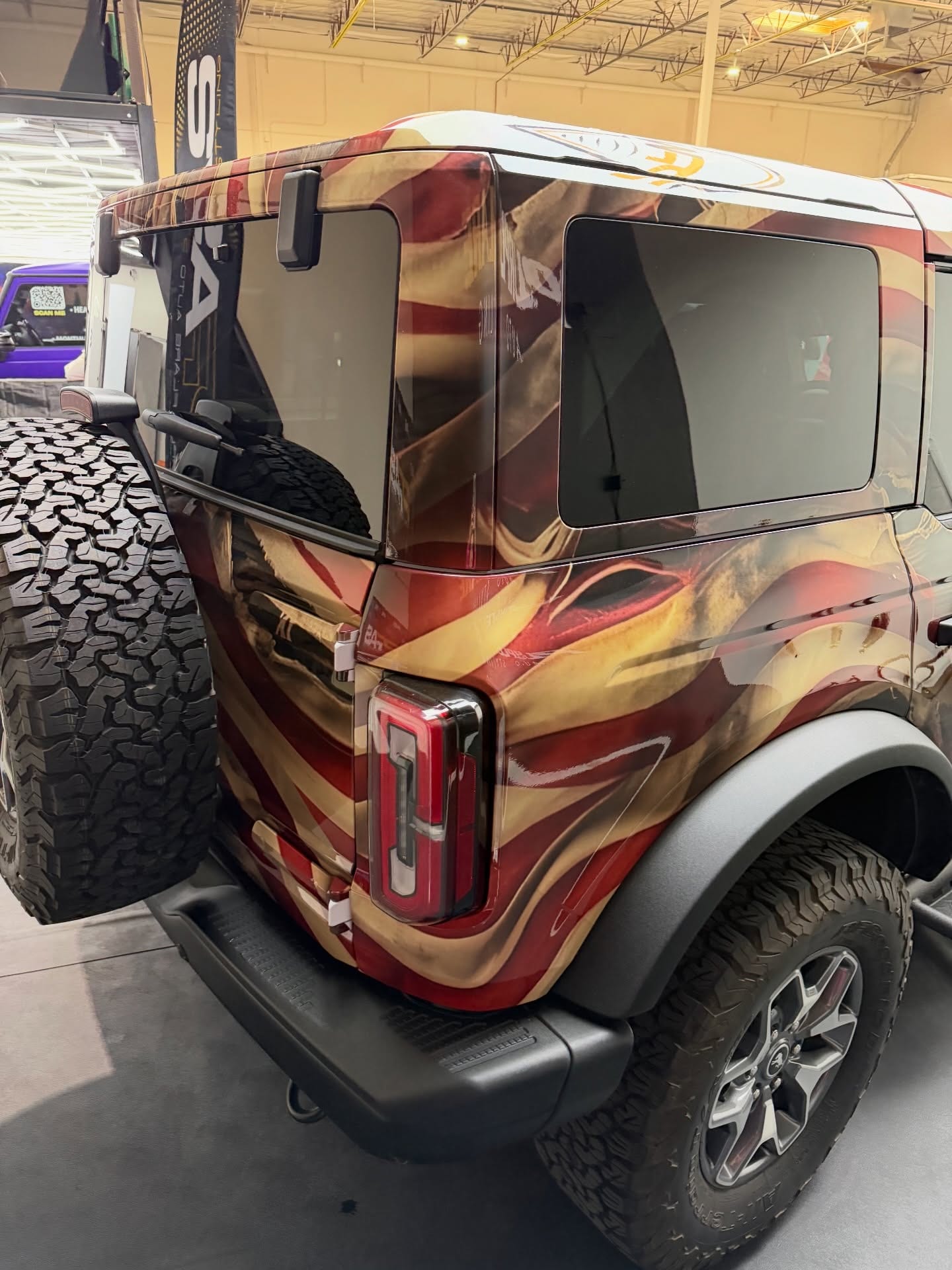 printed ppf wrap — rear quarter of the American flag Bronco showing the printed PPF stripes wrapping the body