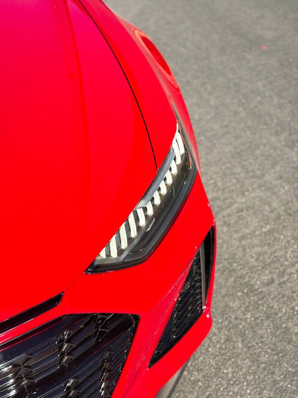 2026 Audi RS6 Avant audi rs6 ppf install in candy apple red at Purple Flare Wraps Henderson