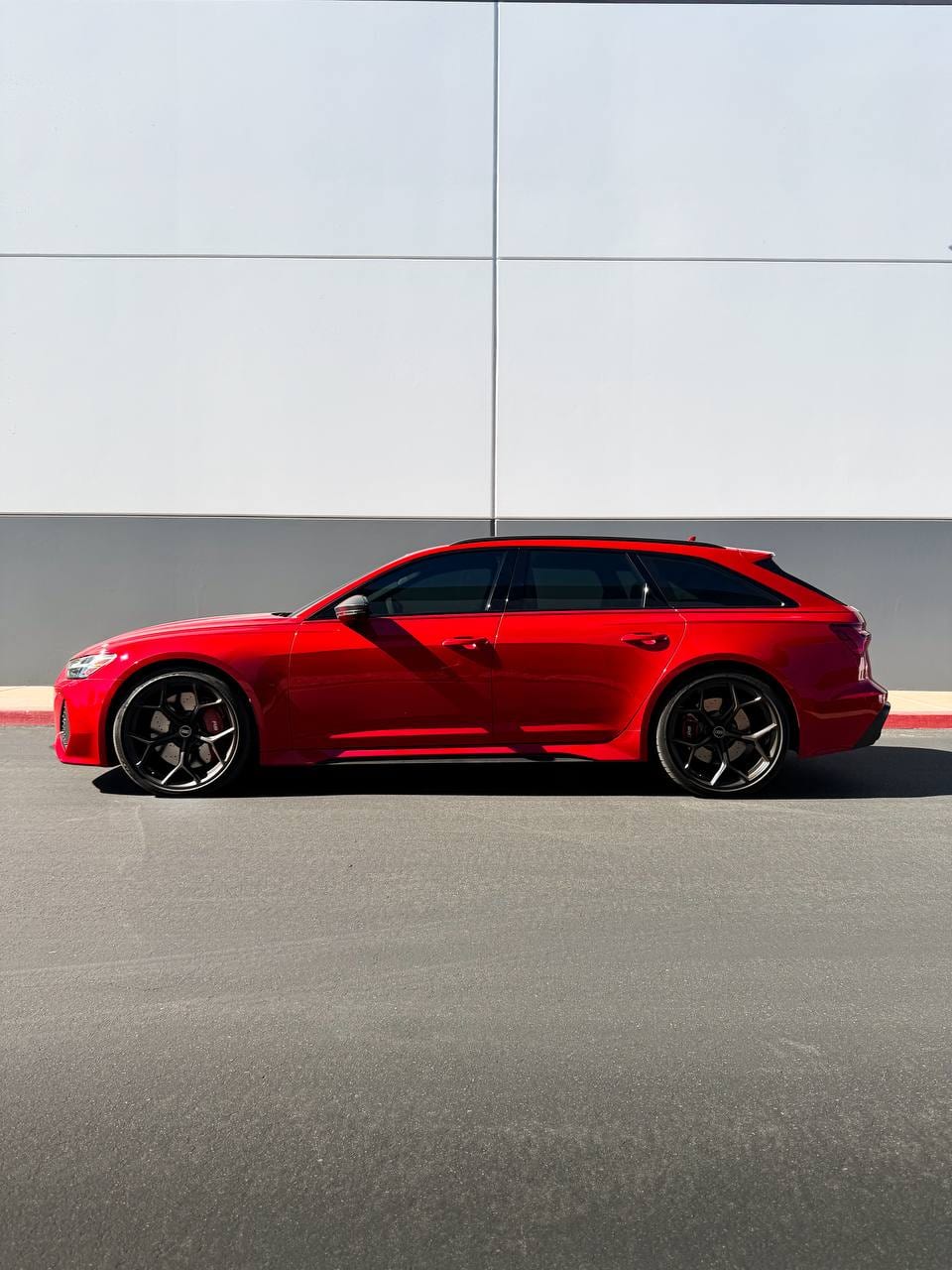 2026 Audi RS6 Avant audi rs6 ppf install in candy apple red at Purple Flare Wraps Henderson