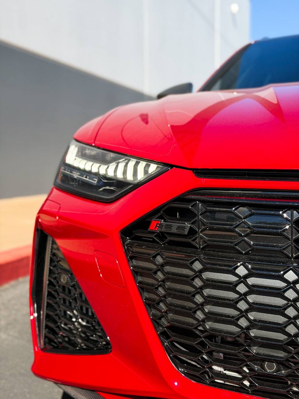 2026 Audi RS6 Avant audi rs6 ppf install in candy apple red at Purple Flare Wraps Henderson