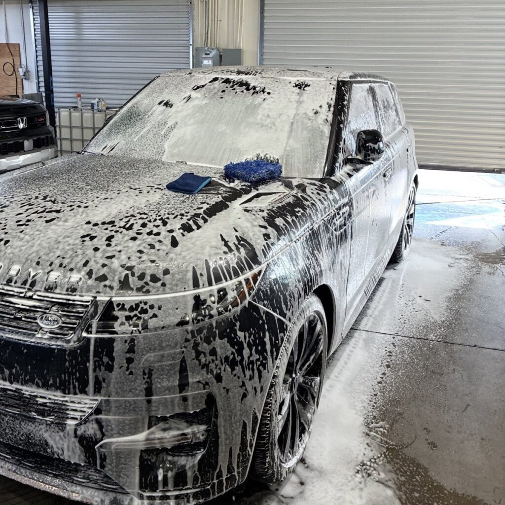 Car detailing in Henderson: Range Rover Sport foam pre-wash at Purple Flare Wraps