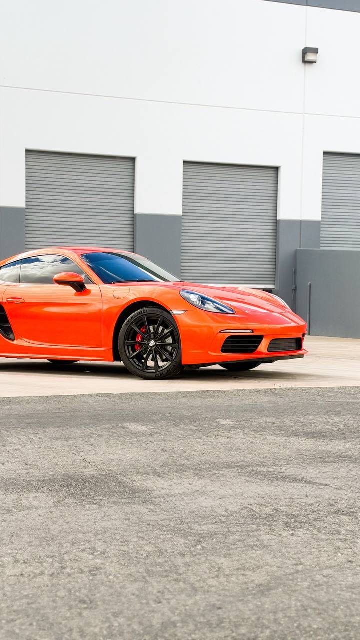 2020 Porsche 718 Cayman S color change wrap from Miami Blue to blaze orange at Purple Flare Wraps in Henderson