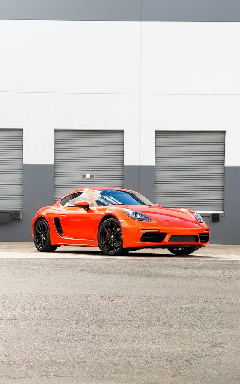 2020 Porsche 718 Cayman S color change wrap from Miami Blue to blaze orange at Purple Flare Wraps in Henderson