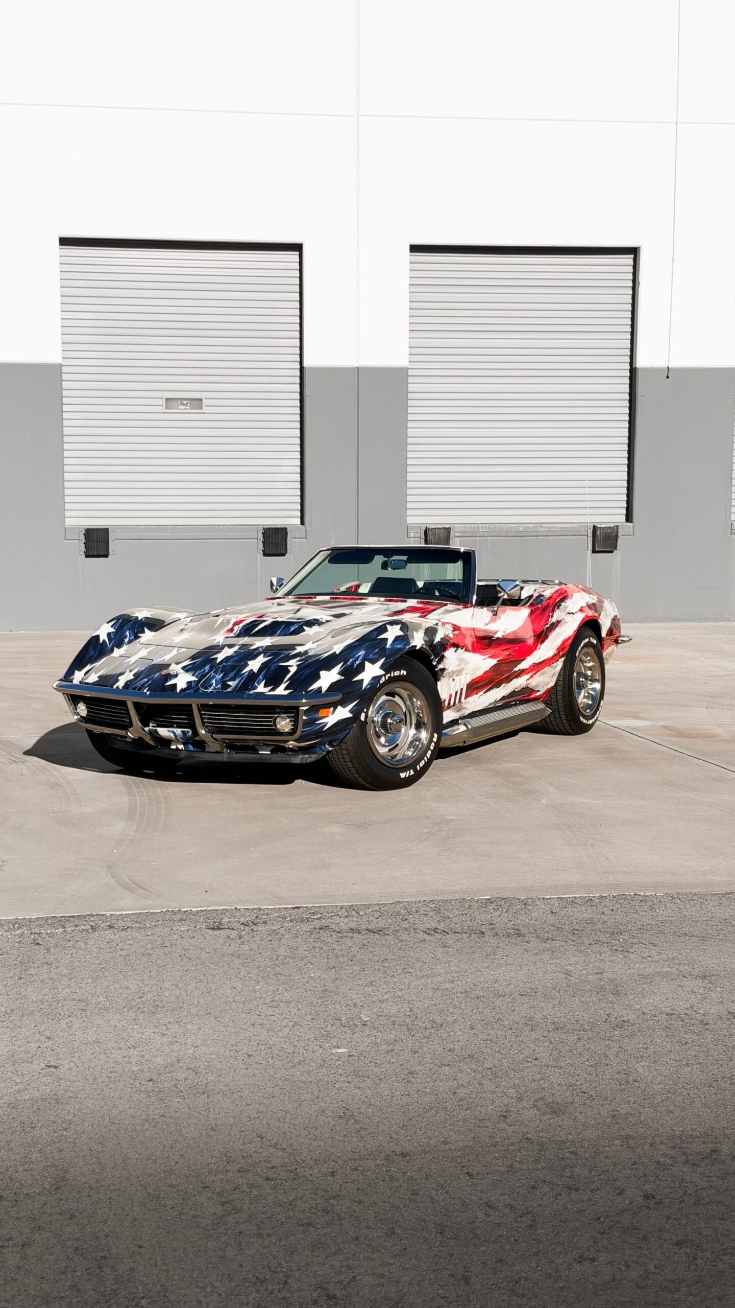 1969 Chevrolet Corvette Stingray with a custom printed wrap flag design at Purple Flare Wraps Henderson