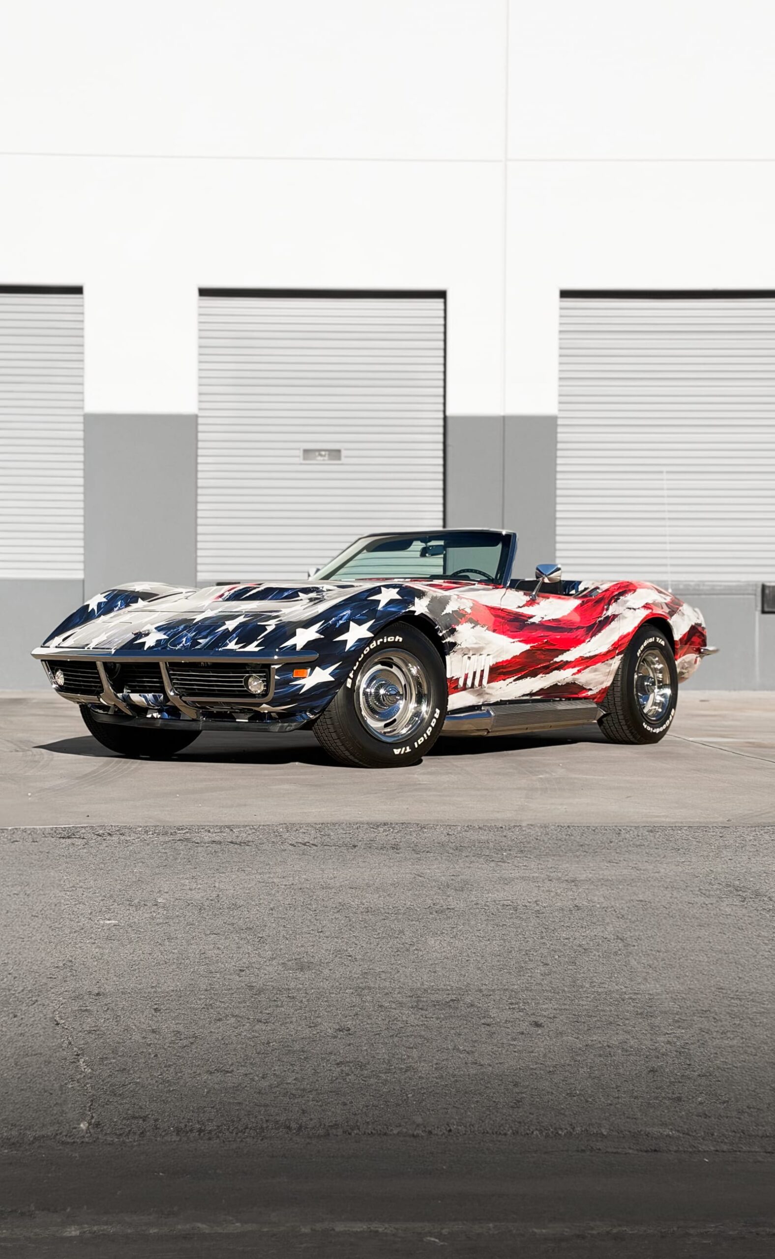 1969 Chevrolet Corvette Stingray with a custom printed wrap flag design at Purple Flare Wraps Henderson