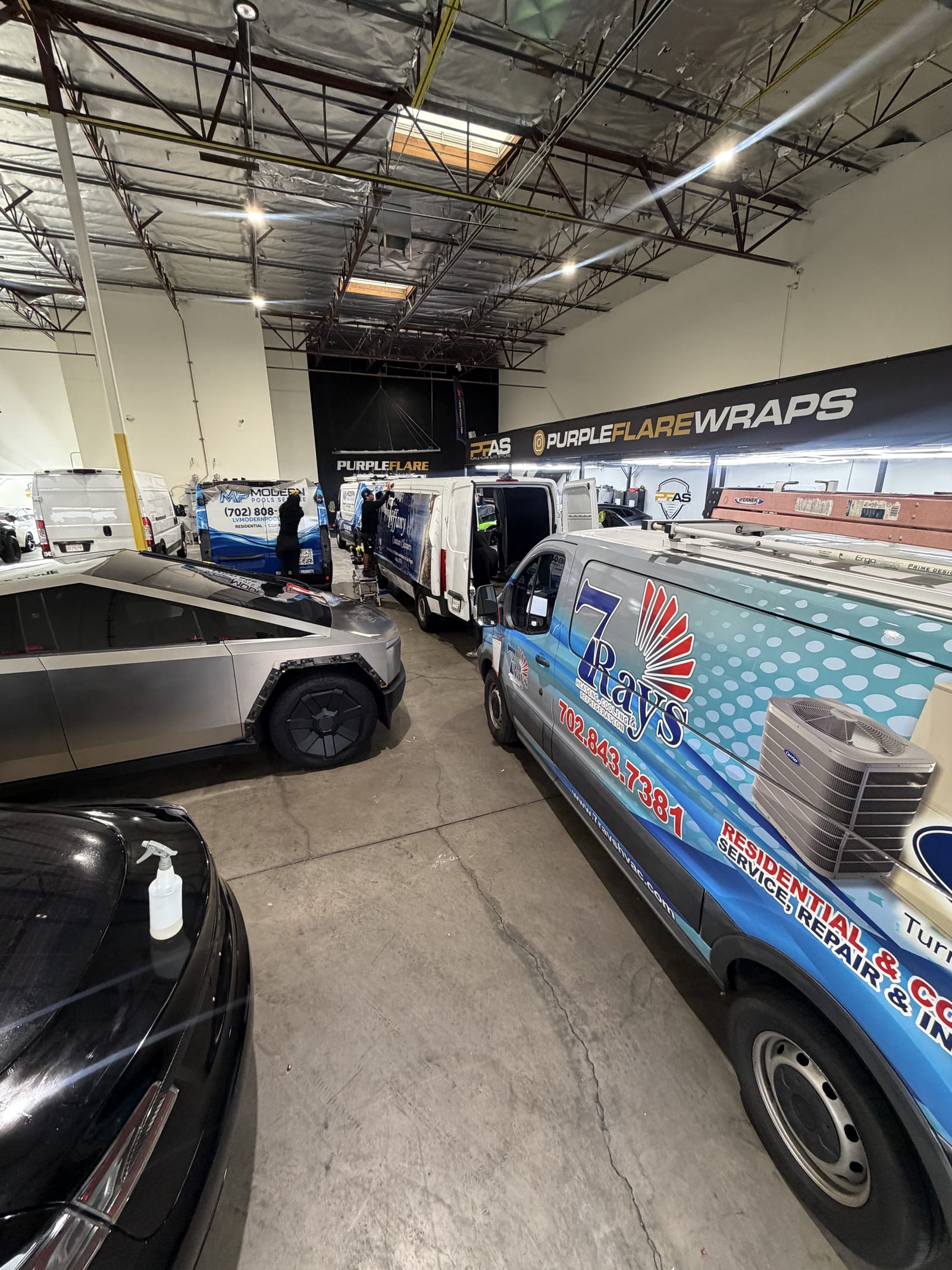 Lineup of three fleet van wraps completed at Purple Flare Wraps in Henderson, NV