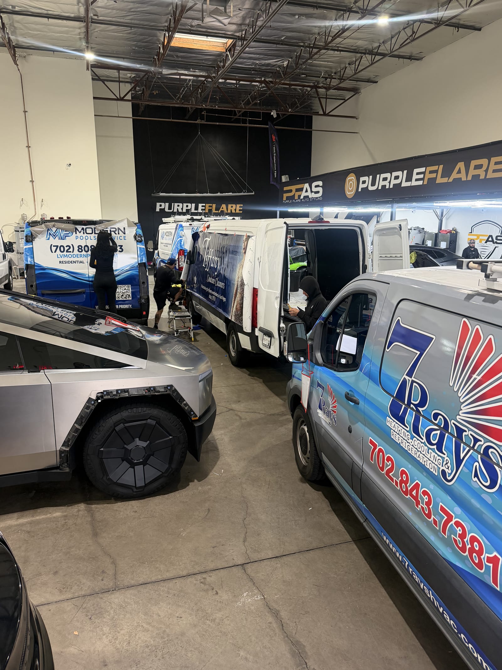 Lineup of three fleet van wraps completed at Purple Flare Wraps in Henderson, NV