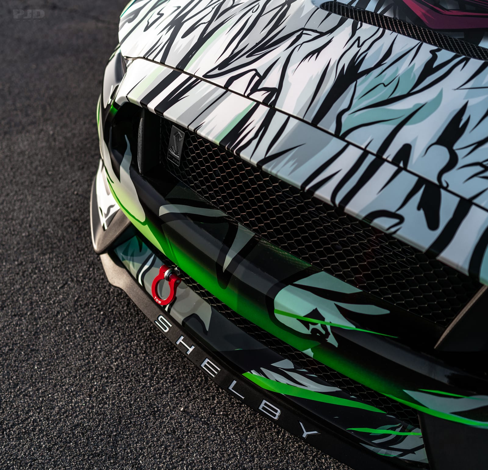 Mustang GT Superman-themed mustang custom printed wrap by Purple Flare Wraps in Henderson, NV