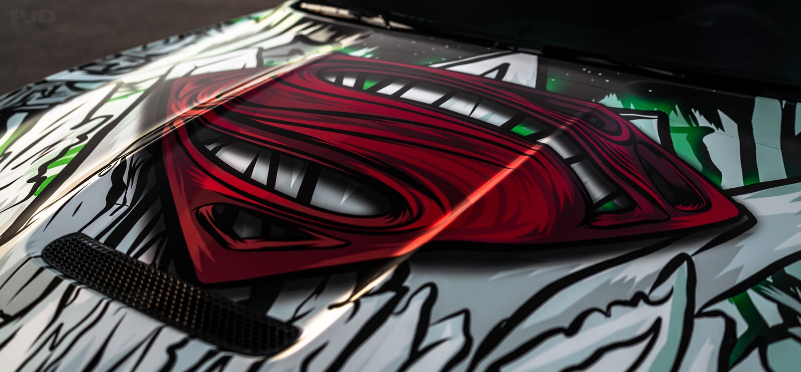 Mustang GT Superman-themed mustang custom printed wrap by Purple Flare Wraps in Henderson, NV