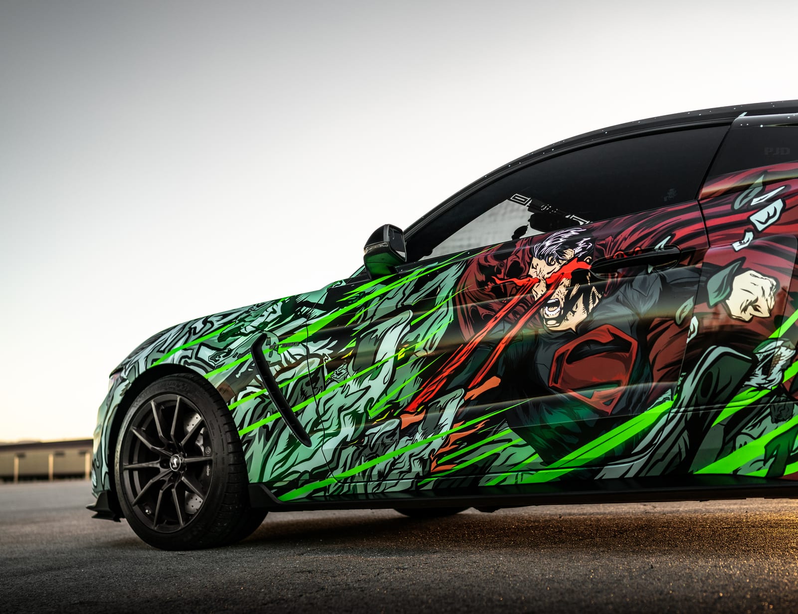 Mustang GT Superman-themed mustang custom printed wrap by Purple Flare Wraps in Henderson, NV