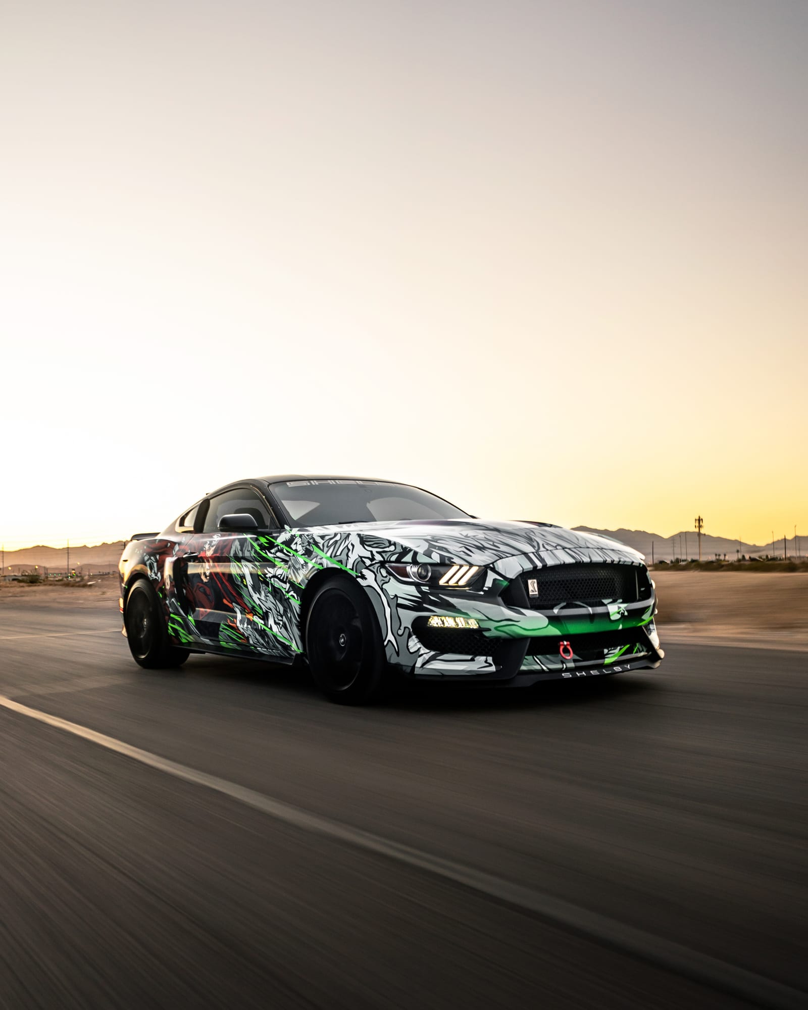 Mustang GT Superman-themed mustang custom printed wrap by Purple Flare Wraps in Henderson, NV
